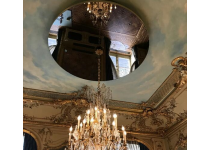 miroir bronze rond au plafond